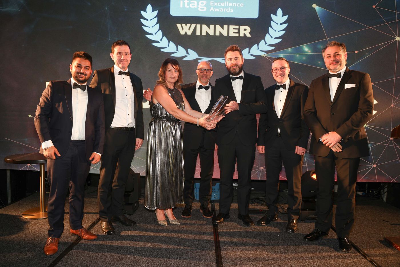 Boston Scientific Galway team on stage with the ITAG Excellence Award.
